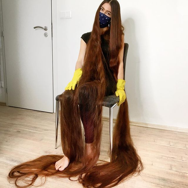 With 90 Inches Of Flowing Brown Locks This Real Life Rapunzel Has Hair Brushing The Ground Behind Her2