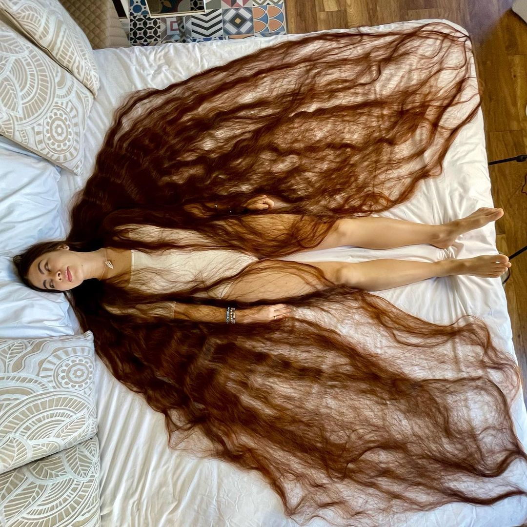 With 90 Inches Of Flowing Brown Locks This Real Life Rapunzel Has Hair Brushing The Ground Behind Her4