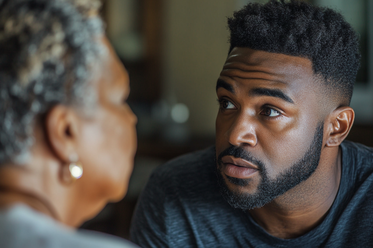 A man speaking to his mother | Source: Midjourney