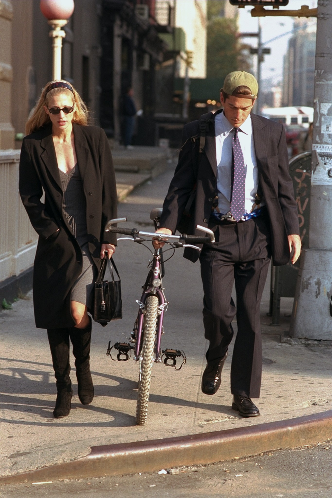 Carolyn Bessette-Kennedy and John F. Kennedy Jr. spotted on a walk in 1996. | Source: Getty Images