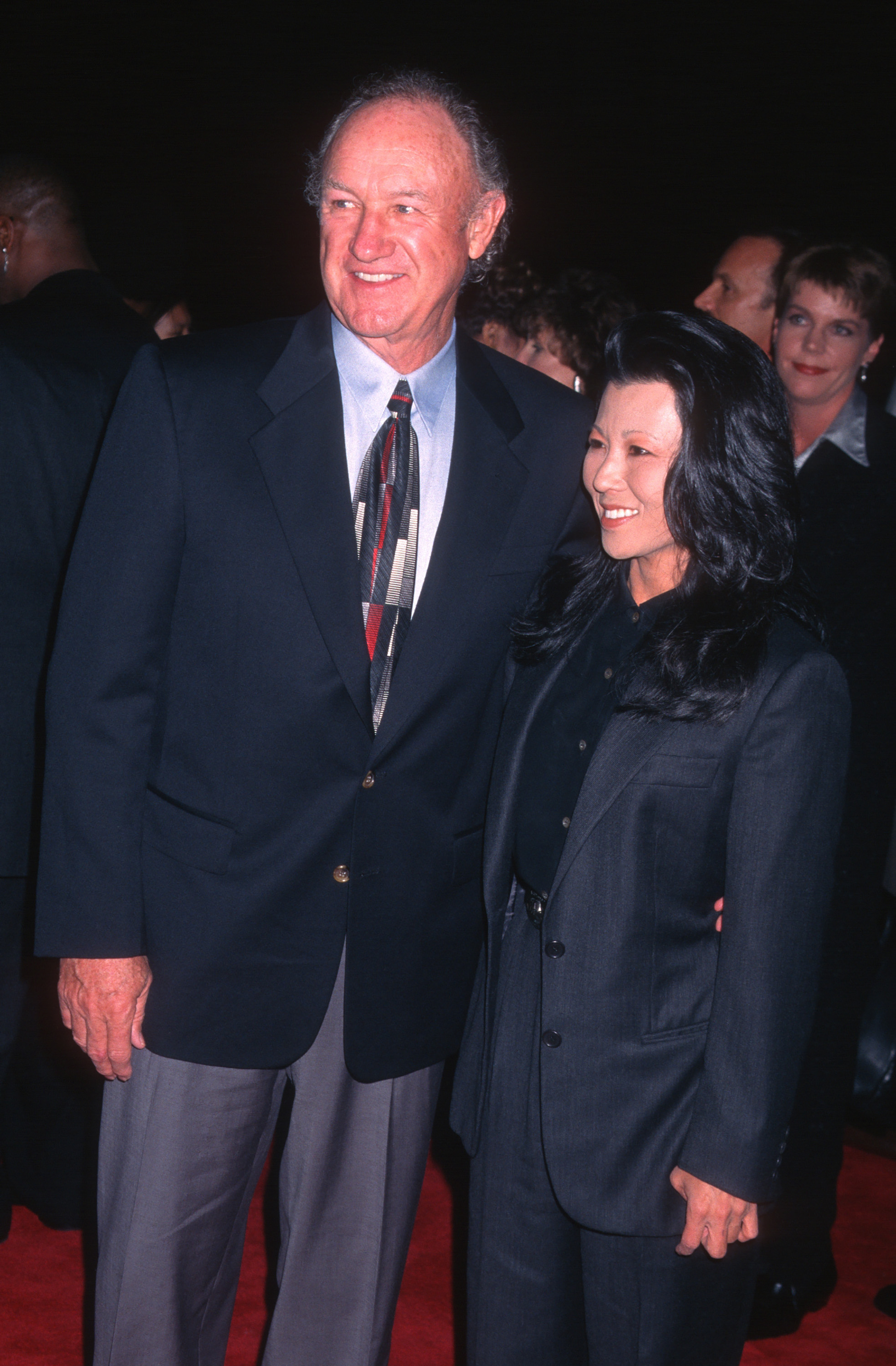 Gene Hackman and Betsy Arakawa attend a premiere of "The Chamber" at the Academy Theater, Beverly Hills, California, on October 2, 1996.| Source: Getty Images