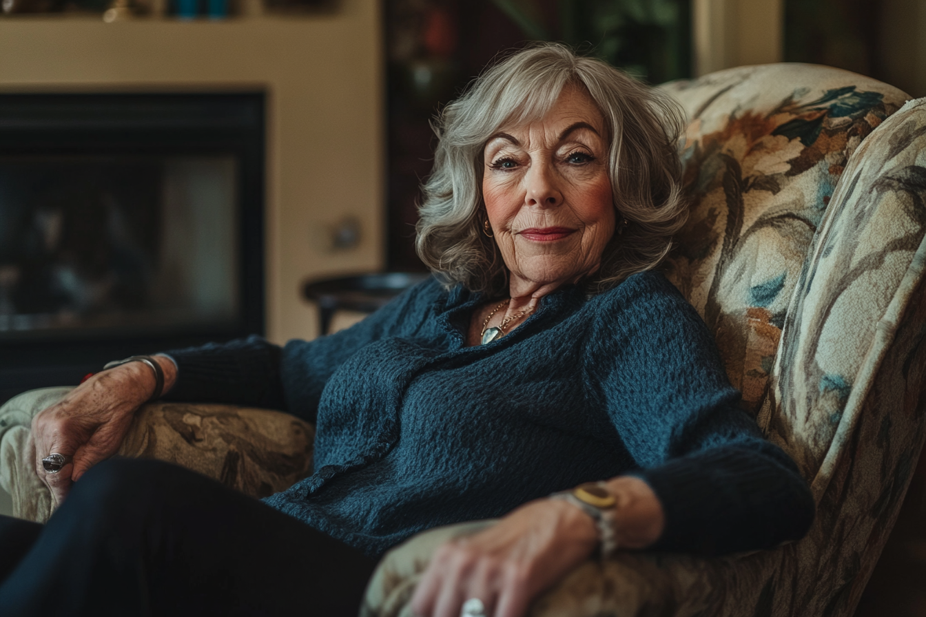 An older woman sitting on a couch with a haughty expression | Source: Midjourney