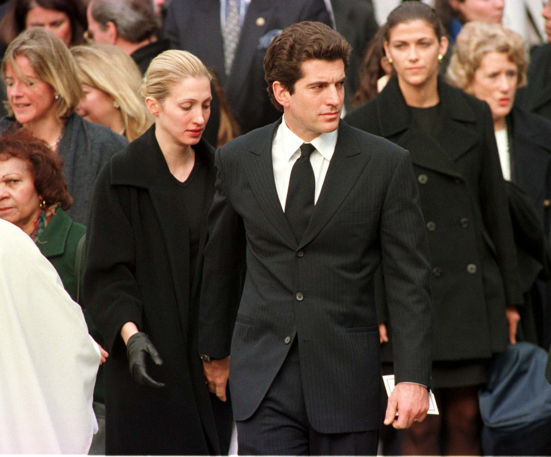 Carolyn Bessette-Kennedy and John F. Kennedy Jr. after Michael Kennedy's funeral in 1998 in Boston, Massachusetts. | Source: Getty Images