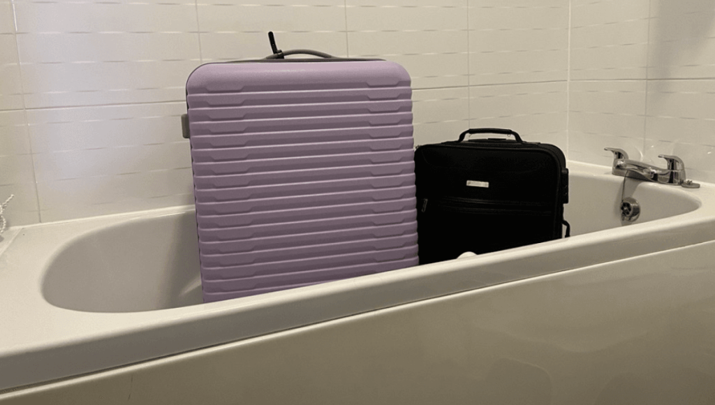 luggage in bathtub meta 1024x580 1