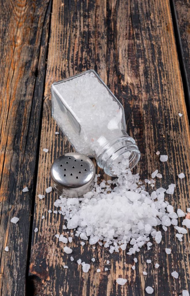 sea salt coming out open salt shaker with its cap 176474 1688 11zon 658x1024 1