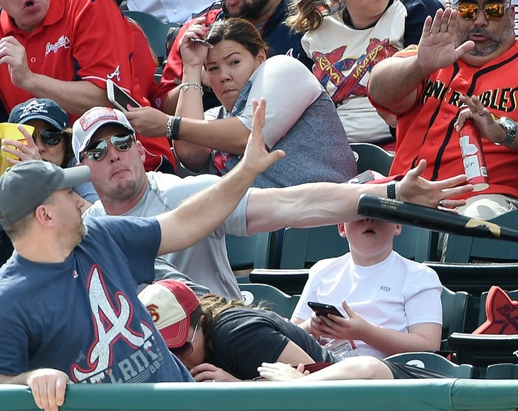 A Father Unleashes "Superdad Powers" to Stop a Flying Baseball Bat From Hitting the Son's Head 1 112 1