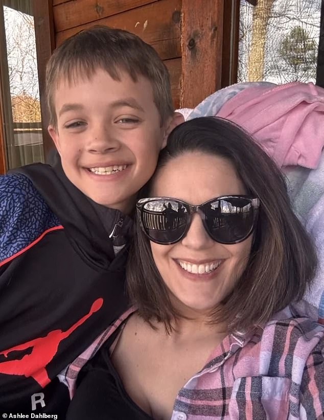 Indiana boy dies just hours after contracting horrific infection at school that spread to his brain 3 His mother Ashlee (pictured together) said she felt 'indescribable pain' as she lay with Liam during his final moments and the medical team turned off his life support