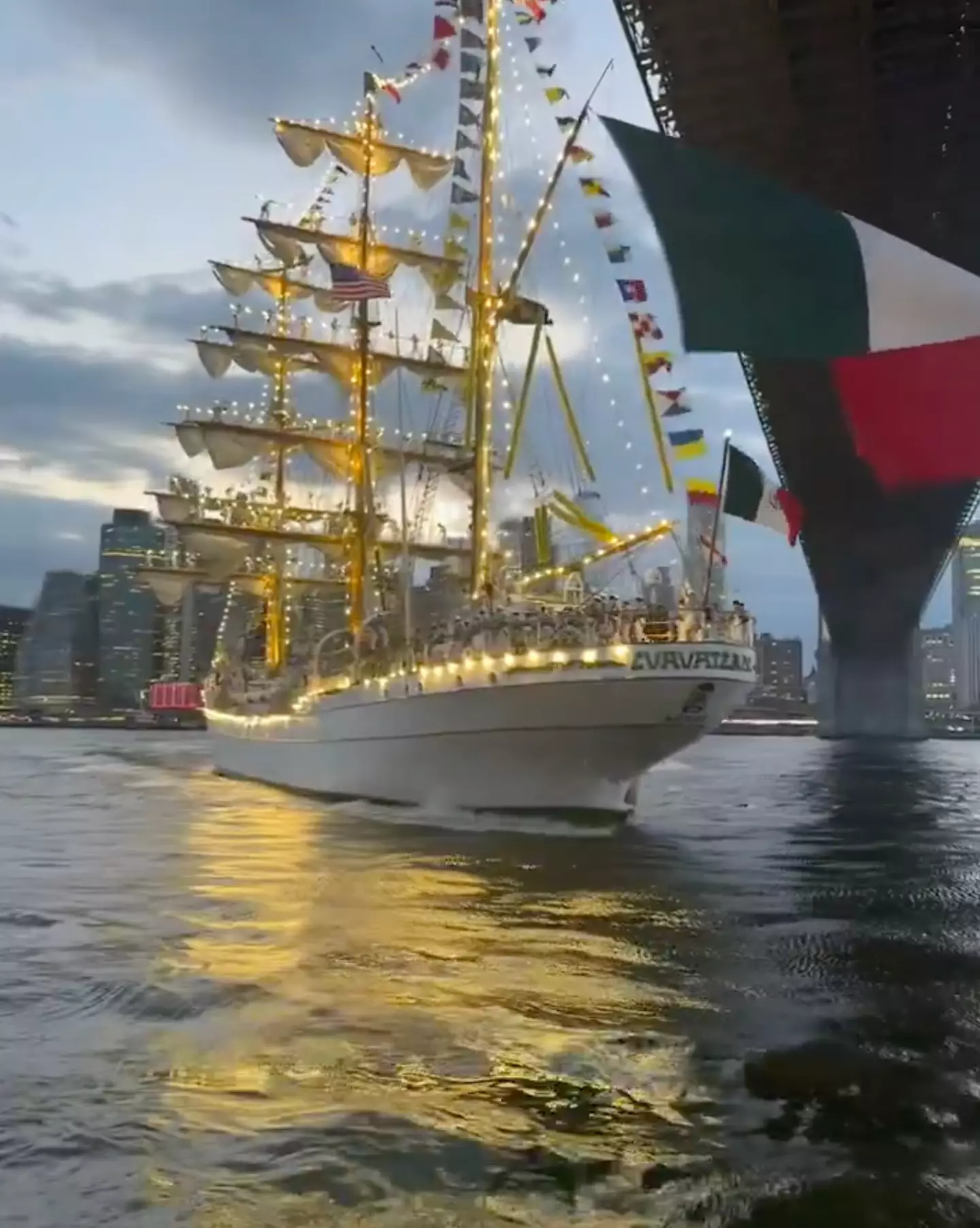 Horrific moment ship smashes into Brooklyn Bridge k!lling at least two people as sailors hang on to mast 2 download 25 2